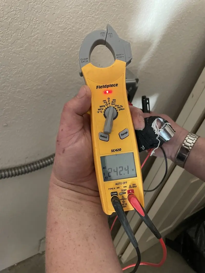Voltage testing with clamp meter during Recessed Lighting Installation in Bonsall